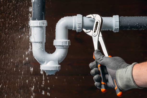 Professional Emergency Plumber technician working in West Leisenring, PA